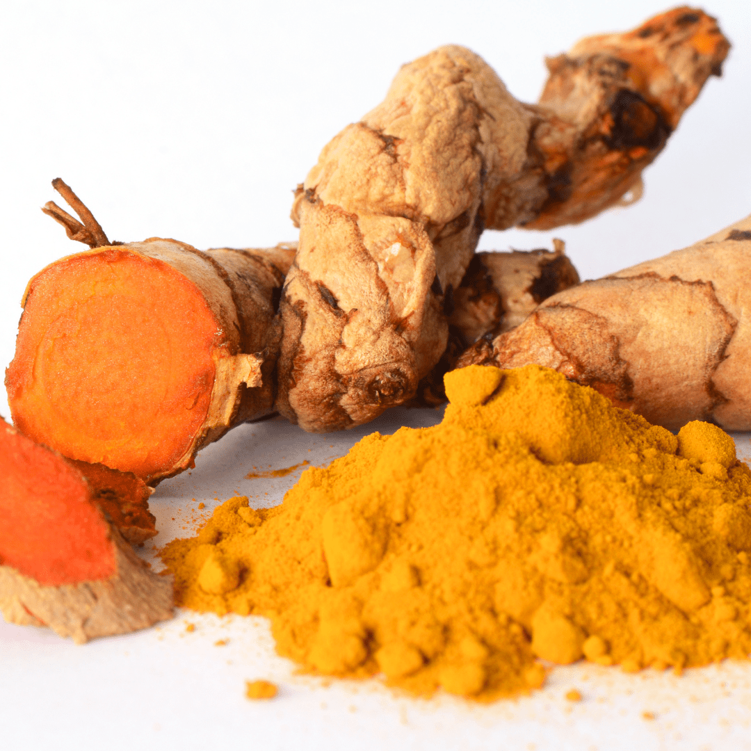 Grounded Gratered Tumeric on a white background