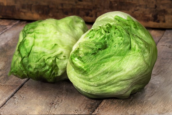 Two lettuce on a table