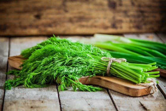 bunch of dill on cutting board