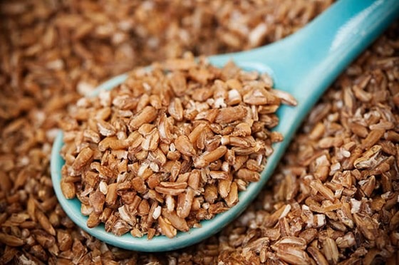 a spoon filled with bulgar