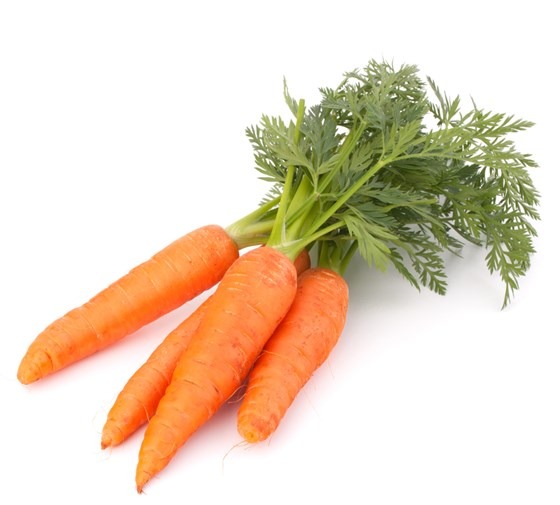 four carrots on white surface