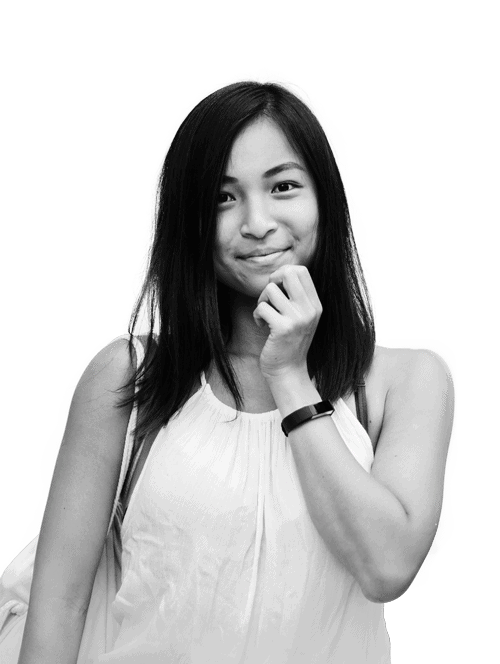 picture of female smiling and touching her face