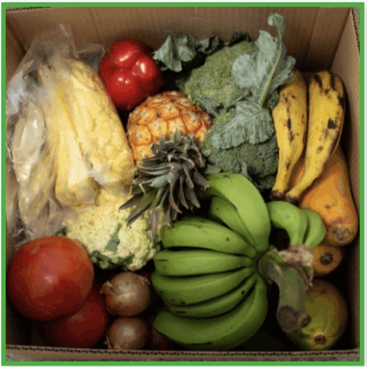 a box of fruits and vegetables ready to be prepared